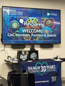 Impression from the RevSpring CAC Meeting - Desk set-up and welcome screen on the computer