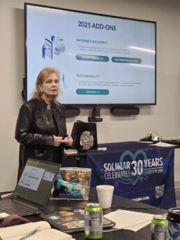 Photo showing Pat McGrew giving a presentation during the RevSpring CAC Meeting